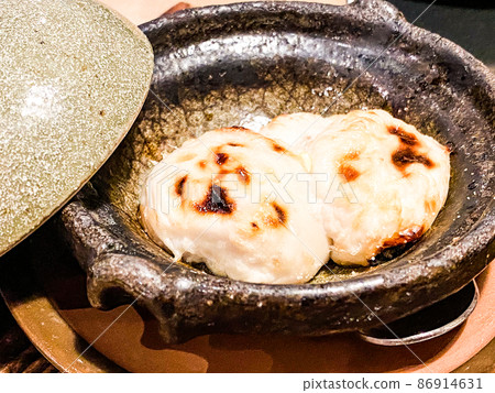 Grilled blowfish milt with salt Grilled blowfish milt with salt 86914631