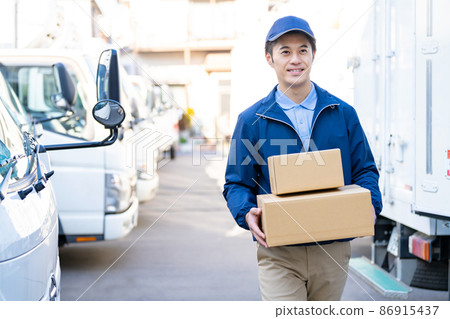 Male staff working by courier Male staff working by courier 86915437