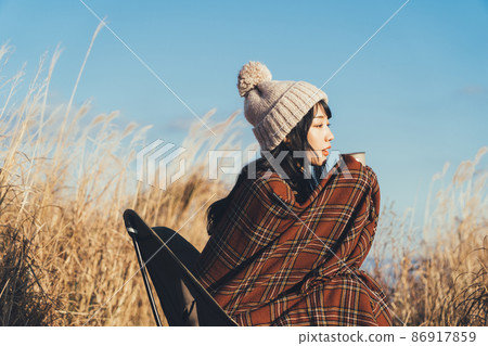 Woman doing solo camp 86917859
