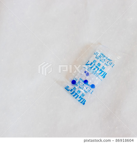 Silica gel bag on white backgrounds Silica gel bag on white backgrounds 86918604