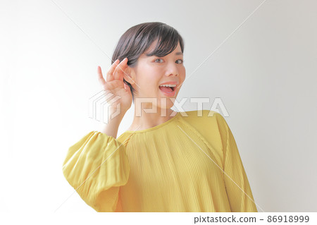 A woman who seems happy to hear 1 A woman who seems happy to hear 1 86918999