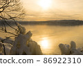 Splash ice that appears on the shores of Lake Inawashiro in the midwinter 86922310