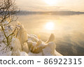 Splash ice that appears on the shores of Lake Inawashiro in the midwinter 86922315