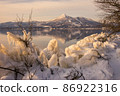 Splash ice that appears on the shores of Lake Inawashiro in the midwinter 86922316