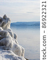 Splash ice that appears on the shores of Lake Inawashiro in the midwinter 86922321
