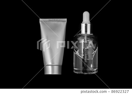 Moisturizer and face serum isolated on black background. Moisturizer and face serum isolated on black background. 86922327
