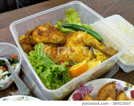 Malaysian traditional Malay cuisine is on display for sale at roadside stalls. Rich in spices and recipes from local ingredients. Customers are free to choose what they like 86923807