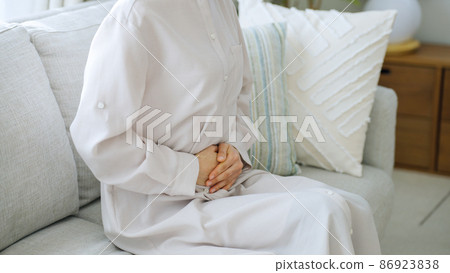 Abdominal pain, menstrual pain, health, health care, middle female Abdominal pain, menstrual pain, health, health care, middle female 86923838