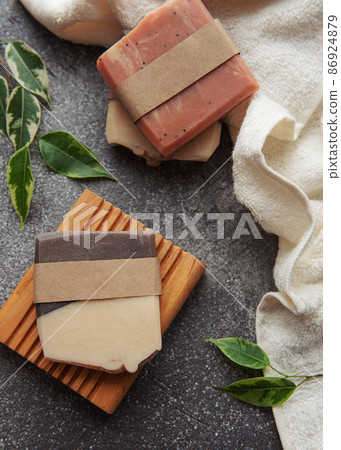 Handmade soap bars and green leaves 86924879