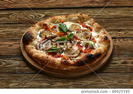 food background vegan sliced pizza with various vegetables 86925595