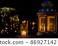 Gently lit candles and lanterns 86927142
