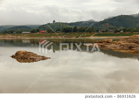 Mekong River. Border between Laos and Thailand. View of the river from Laos. Vientiane Province Mekong River. Border between Laos and Thailand. View of the river from Laos. Vientiane Province 86931626