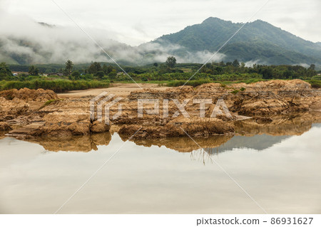 Mekong River. Border between Laos and Thailand. View of the river from Laos. Vientiane Province Mekong River. Border between Laos and Thailand. View of the river from Laos. Vientiane Province 86931627