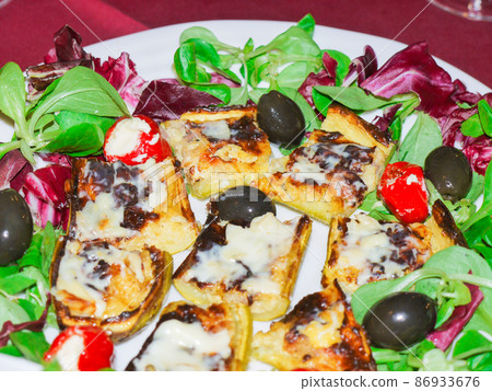 Croatian home-cooked zucchini and cheese baked in the oven Croatian home-cooked zucchini and cheese baked in the oven 86933676