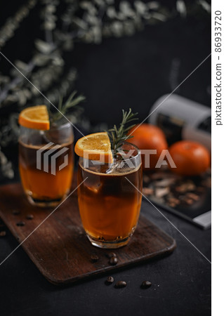 iced americano black coffee and layer of orange iced americano black coffee and layer of orange 86933720