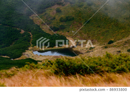Overcast autumn Carpathians, picturesque mountain landscapes, Carpathian Ukrainian National Park. Overcast autumn Carpathians, picturesque mountain landscapes, Carpathian Ukrainian National Park. 86933800