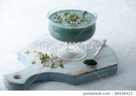 Spirulina Smoothie with microgreens and pine nuts Spirulina Smoothie with microgreens and pine nuts 86936421