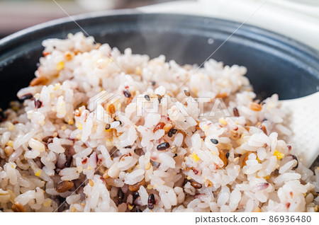 Cooked millet rice 86936480