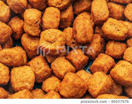 Dry pet food pellets. Macro. 86937976
