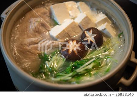 Cooked chicken wings with water 86938140