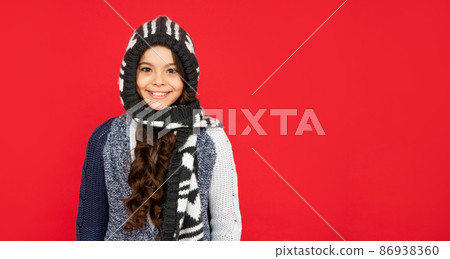 portrait of child wearing warm clothes. express positive emotion. winter fashion. copy space portrait of child wearing warm clothes. express positive emotion. winter fashion. copy space 86938360