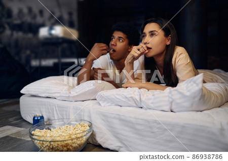 Evening film watch on projector at home 86938786