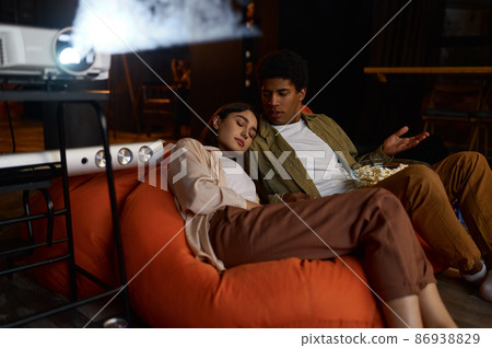 Family watching movie enjoy relax home time 86938829