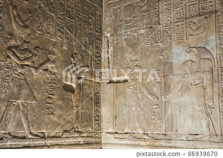 Bas-reliefs of the ancient Temple of Horus in Edfu, Egypt Bas-reliefs of the ancient Temple of Horus in Edfu, Egypt 86939870