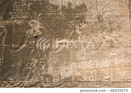 Bas-reliefs of the ancient Temple of Horus in Edfu, Egypt Bas-reliefs of the ancient Temple of Horus in Edfu, Egypt 86939874