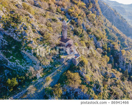 Kotor Old Town Ladder of Kotor Fortress Hiking Trail. Aerial drone view Kotor Old Town Ladder of Kotor Fortress Hiking Trail. Aerial drone view 86941466