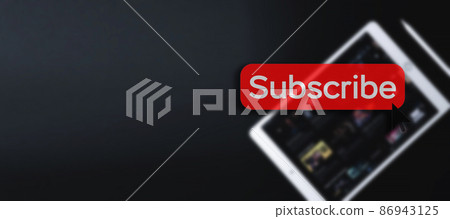 Subscription service. Online video red subscribe button. Internet service on laptop digital tablet blured banner background. Streaming video. Communication network. 86943125