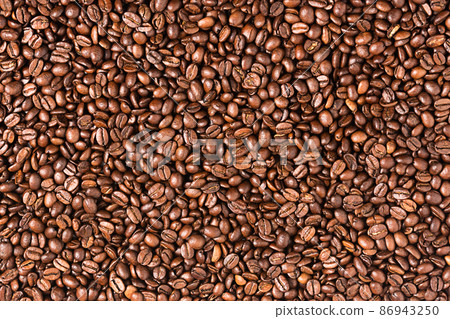 Roasted coffee beans background. Coffee beans texture. Roasted coffee beans background. Coffee beans texture. 86943250