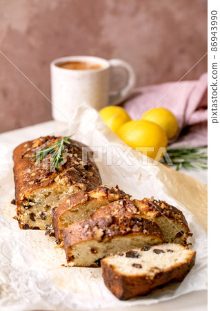 Homemade lemon cake with nuts and rosemary Homemade lemon cake with nuts and rosemary 86943990