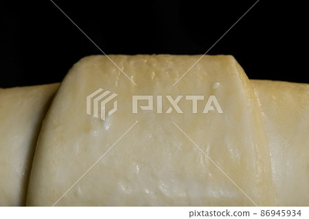 Homemade croissant baking and rising in electric oven Homemade croissant baking and rising in electric oven 86945934