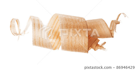 Curly wood shaving isolated on white background Curly wood shaving isolated on white background 86946429