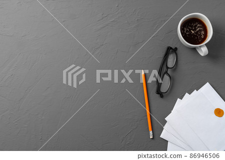 Letters and Office Supplies on Table Desk. Top View Letters and Office Supplies on Table Desk. Top View 86946506