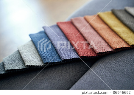 Colorful upholstery fabric samples on the home sofa Colorful upholstery fabric samples on the home sofa 86946692