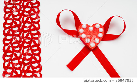 Template on the theme of valentine's day, romantic letterhead for cards, invitations, copy space.Red heart with a bow on a white background. Template on the theme of valentine's day, romantic letterhead for cards, invitations, copy space.Red heart with a bow on a white background. 86947035