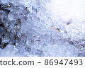Frozen water drops in winter. 86947493