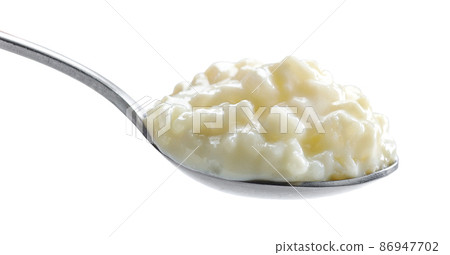 spoon of rice and milk pudding spoon of rice and milk pudding 86947702