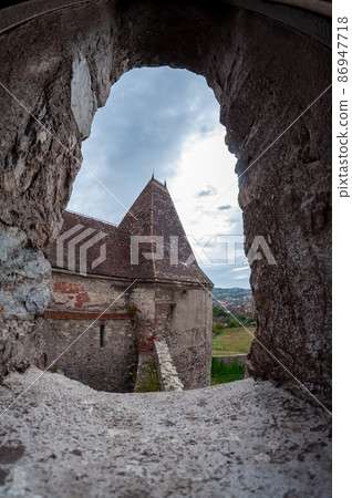 A view of the castle through an arrowslit A view of the castle through an arrowslit 86947718
