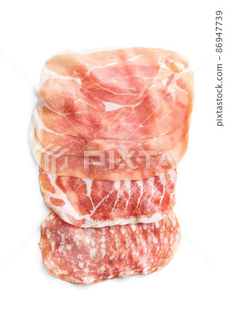 Italian dried ham. Coppa Stagionata, prosciutto and salami isolated on white background. Italian dried ham. Coppa Stagionata, prosciutto and salami isolated on white background. 86947739