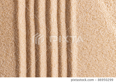 Zen pattern in yellow sand, close up. Zen pattern in yellow sand, close up. 86950299