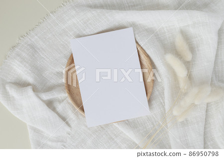 Blank paper cards, Blank greeting card invitation Mockup with flower on desk background, Minimal table workplace composition, flat lay, mockup Blank paper cards, Blank greeting card invitation Mockup with flower on desk background, Minimal table workplace composition, flat lay, mockup 86950798