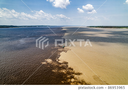 Amazon and Rio Negro, Manaus city, Brazil 86953965