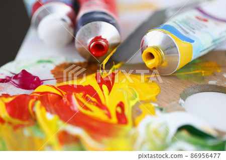 On wooden palette a mixture of paints for painting 86956477