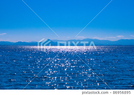 The sparkling water surface of Lake Biwa The sparkling water surface of Lake Biwa 86956895