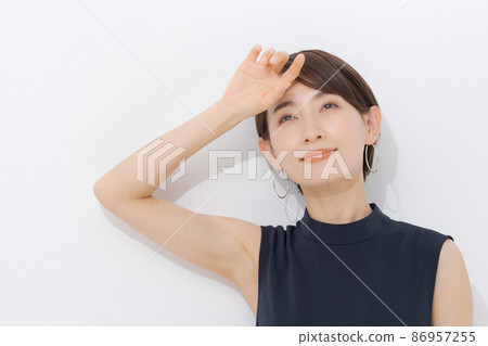 Sleeveless female white background Sleeveless female white background 86957255
