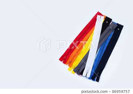 Zippers for clothing on white background. Zippers for clothing on white background. 86959757