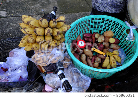 Mobile food store on motorbike to sell cheap breakfast at Ho Chi Minh city, Vietnam Mobile food store on motorbike to sell cheap breakfast at Ho Chi Minh city, Vietnam 86960351